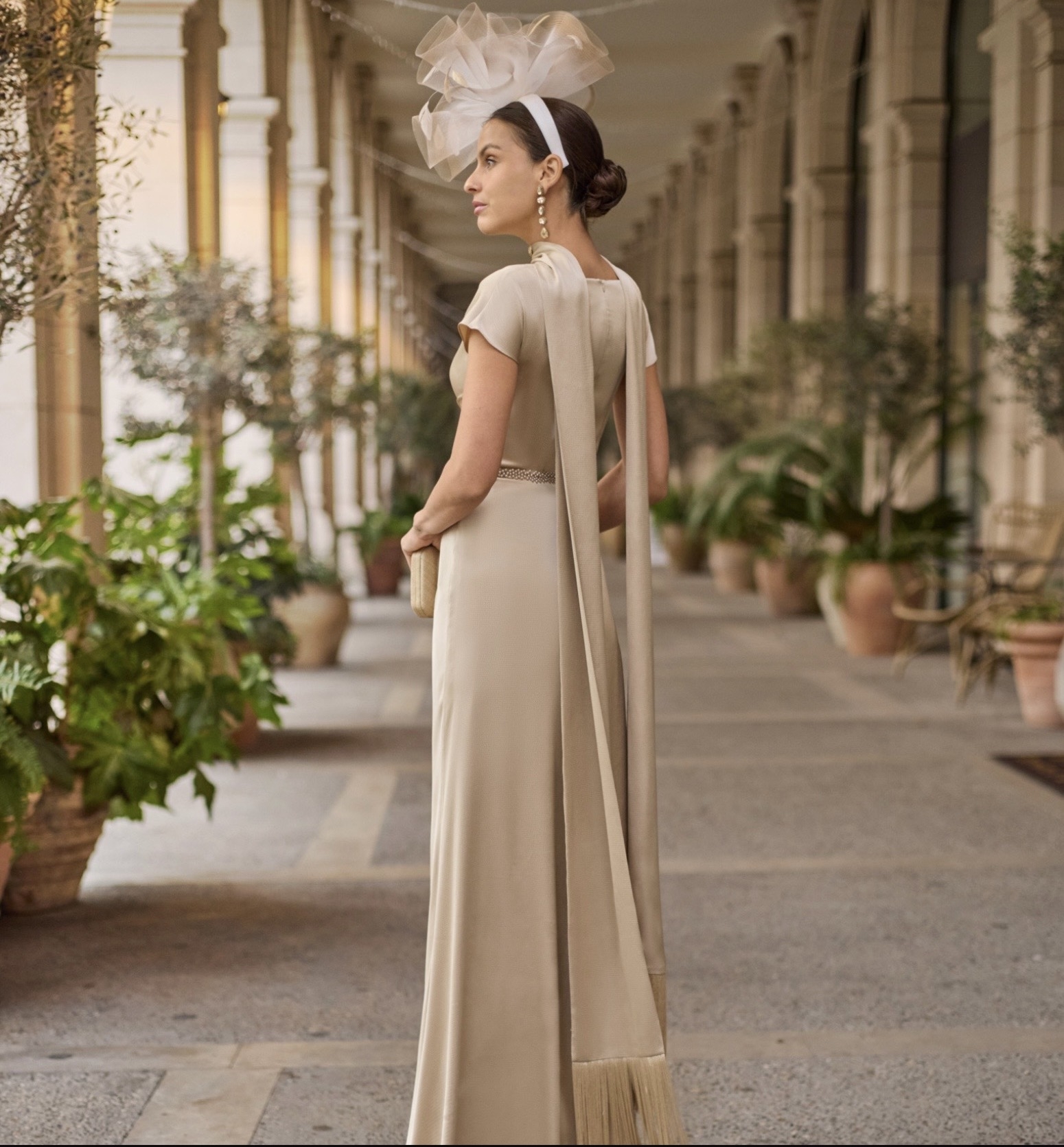 Model wearing a dress by Rosa Clara
