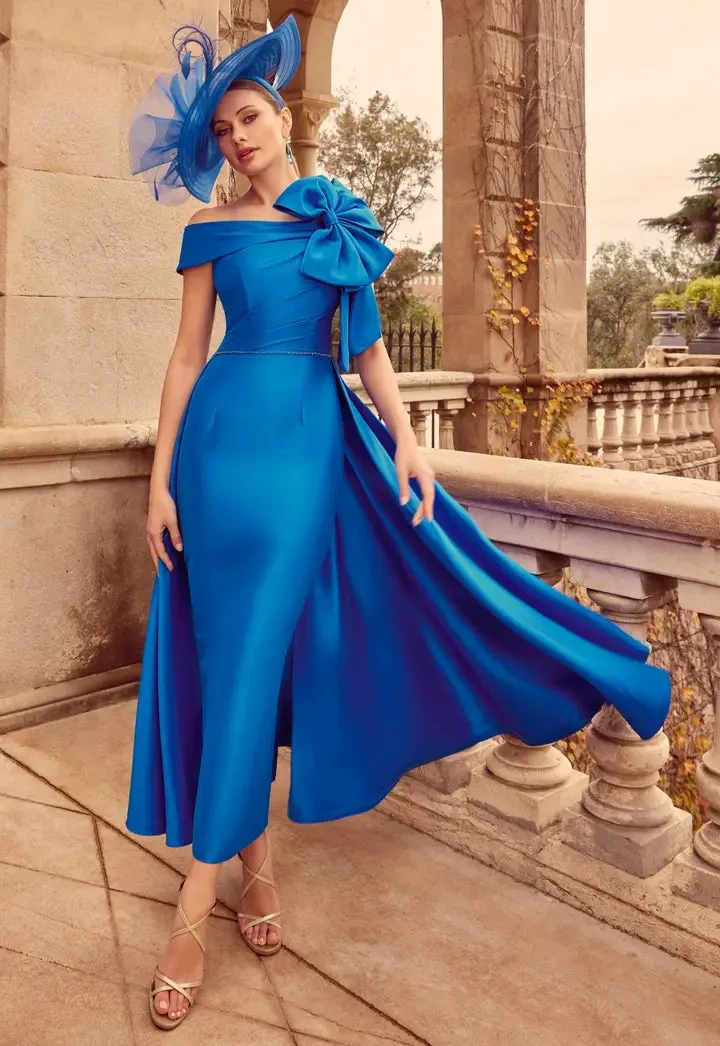 Model wearing a dress by Ronald Joyce